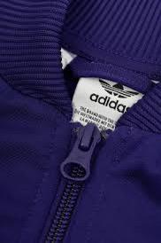 FELPA CON ZIP ADIDAS PRIMA LINEA